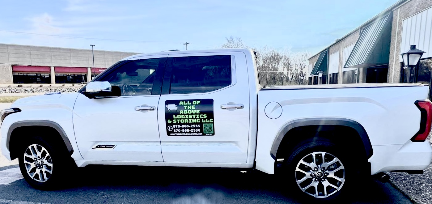 white pickup moving truck